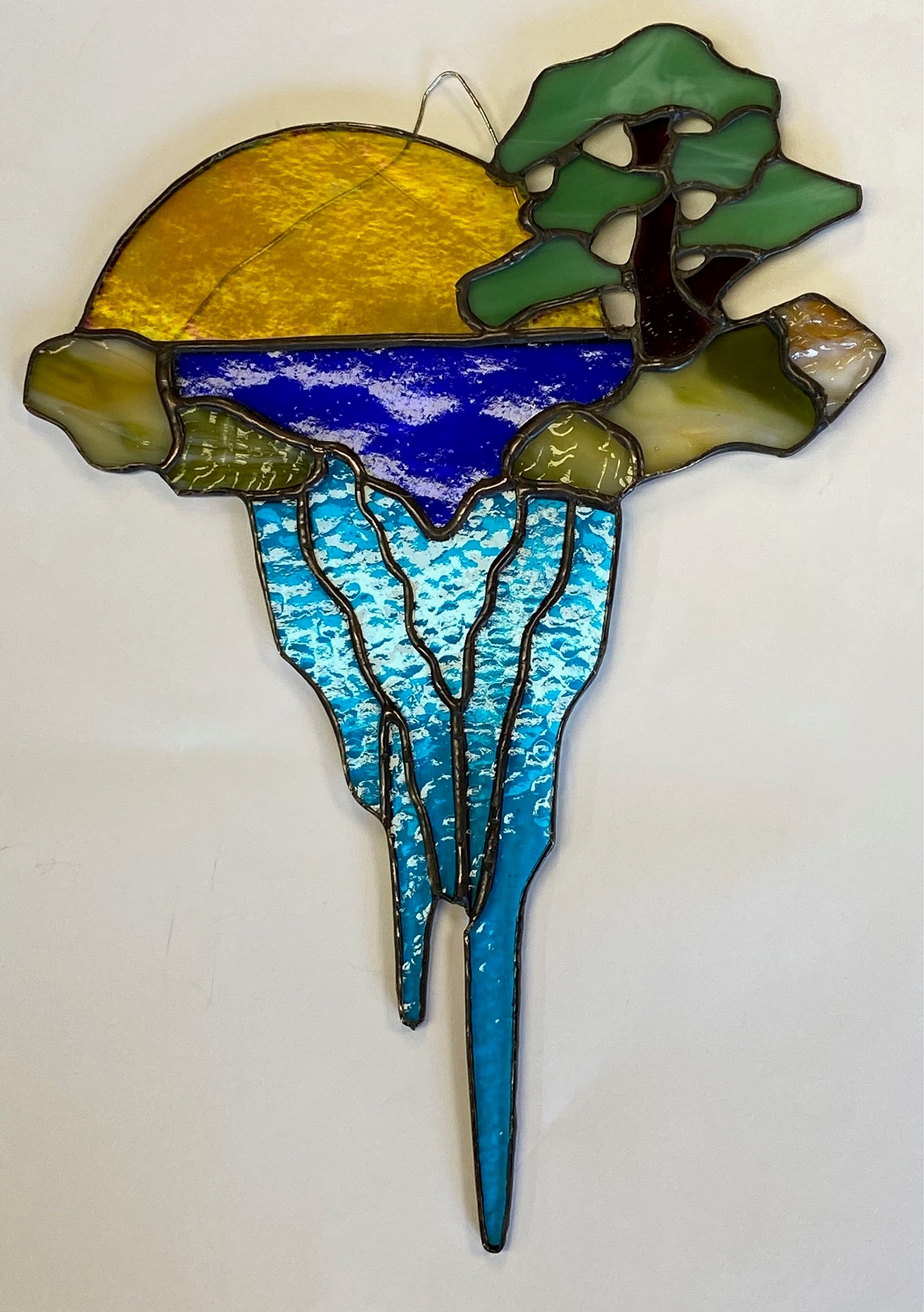 Stained Glass Sun and Water Scene