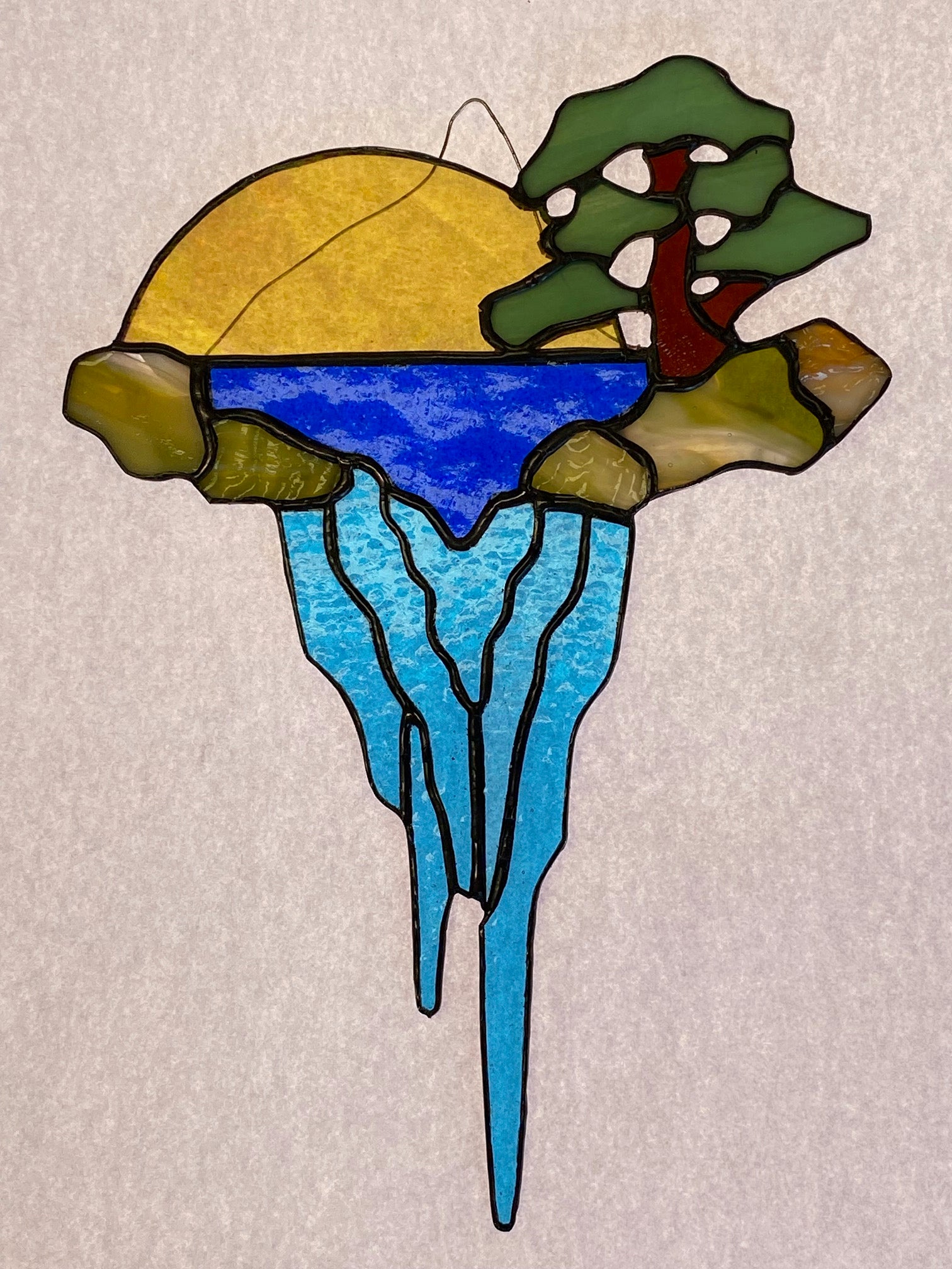 Stained Glass Sun and Water Scene