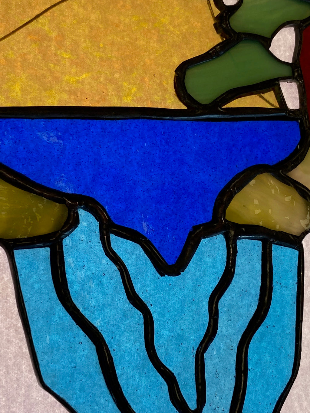 Stained Glass Sun and Water Scene